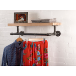 reclaimed wooden shelf with industrial steel pipe brackets and clothes rail