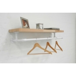 reclaimed wood shelf with industrial steel pipe brackets and hanging clothes rail