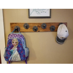 raw steel industrial pipe coat hooks with reclaimed wooden base