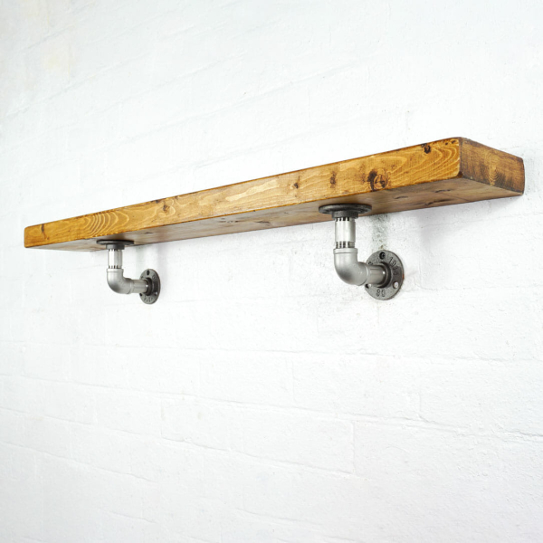 Stainless steel industrial pipe shelving brackets with reclaimed wood scaffolding board shelf