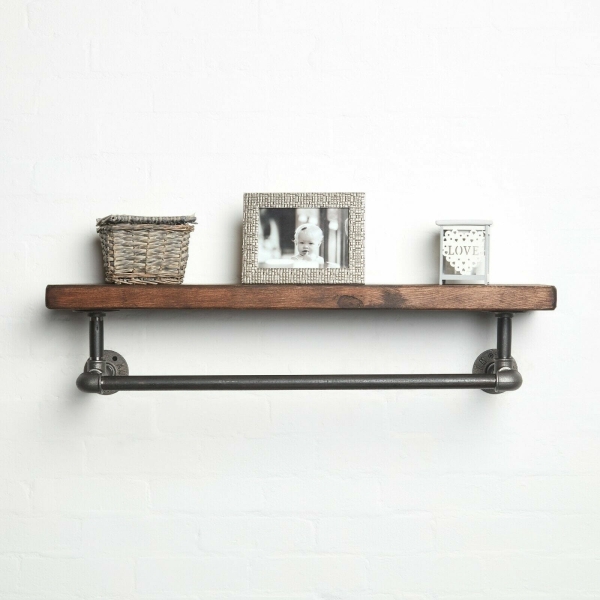 raw steel industrial pipe shelf with elbows, hanging rail and dark wood reclaimed shelf