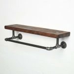 raw steel industrial pipe shelf with elbows, hanging rail and dark wood reclaimed shelf