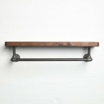 raw steel industrial pipe shelf with elbows, hanging rail and dark wood reclaimed shelf