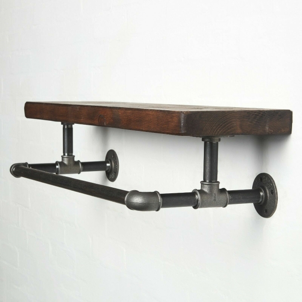 raw steel industrial pipe shelf with elbows, hanging rail and dark wood reclaimed shelf