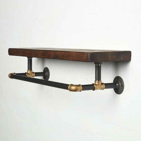 raw steel industrial pipe shelf with brass elbows, hanging rail and dark wood reclaimed shelf