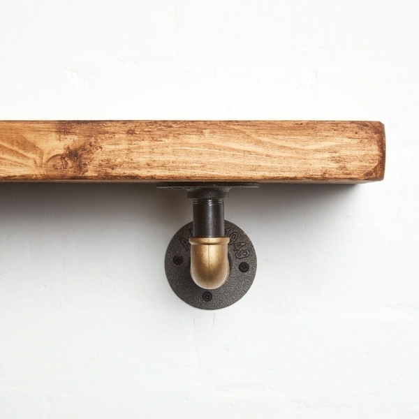 raw steel brass curved elbow shelf bracket close up reclaimed wood shelf