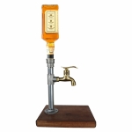 silver industrial steel and brass drinks dispenser