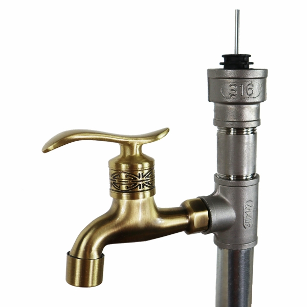 silver industrial steel and brass drinks dispenser