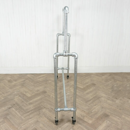 Industrial-silver-key-clamp-clothing-rail-with-wheels-3